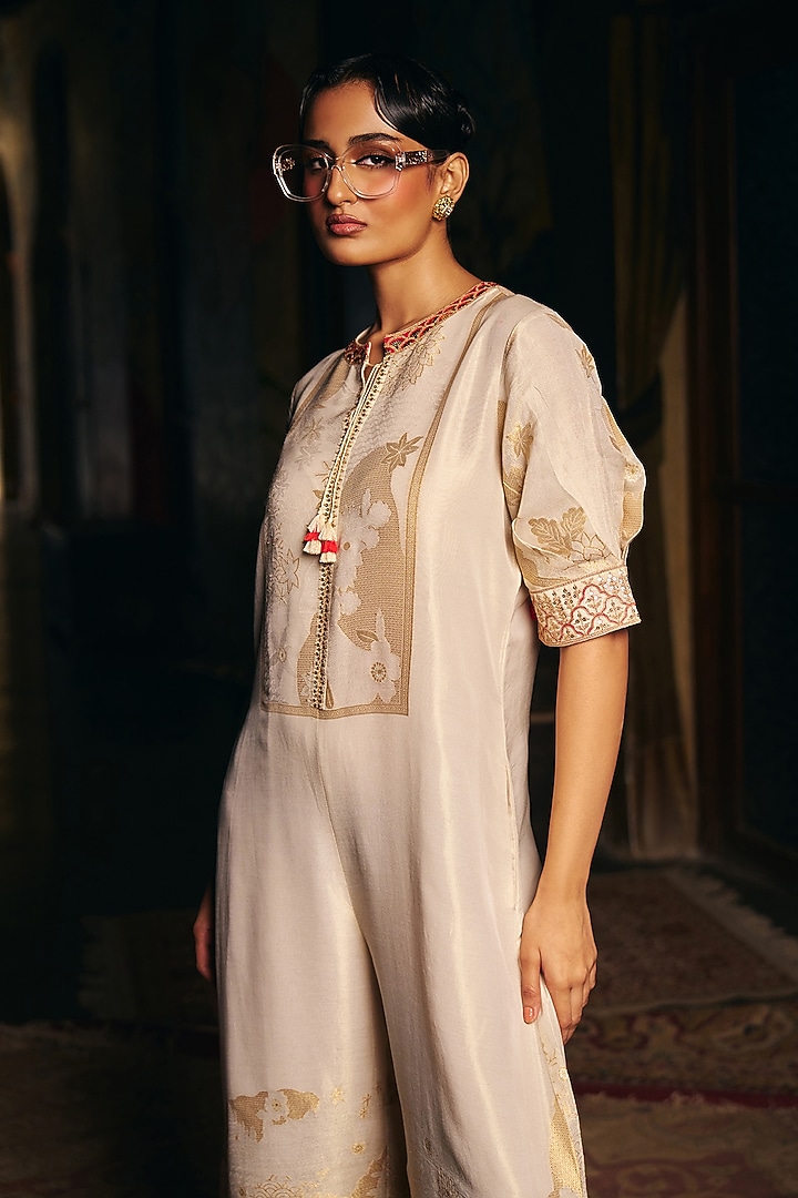 Ivory Fine Chanderi Jacquard Motif Embroidered Jumpsuit by SHRADDHA RAMBHIA at Pernia's Pop Up Shop