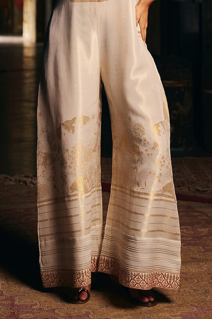 Ivory Fine Chanderi Jacquard Motif Embroidered Jumpsuit by SHRADDHA RAMBHIA at Pernia's Pop Up Shop