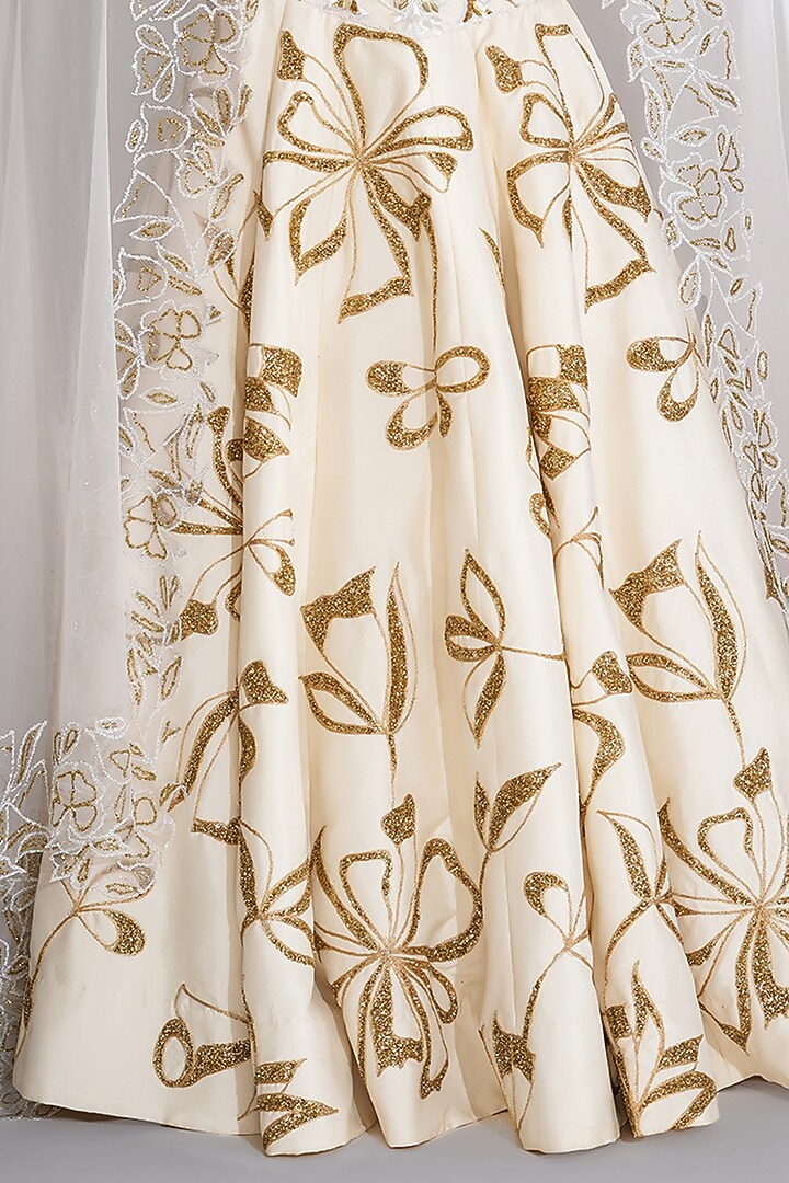 Off-White Silk Golden Sequins Embroidered Wedding Lehenga Set by Shruti S at Pernia's Pop Up Shop