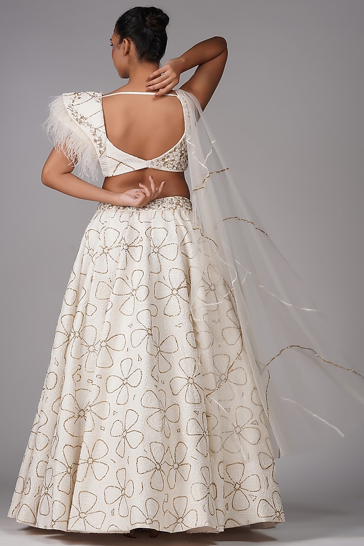 Off-White Star Net Embroidered Wedding Lehenga Set by Shruti S at Pernia's Pop Up Shop
