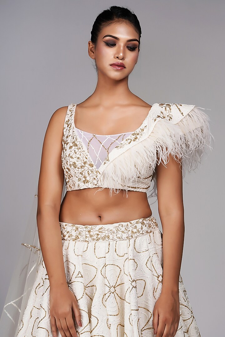 Off-White Star Net Embroidered Wedding Lehenga Set by Shruti S at Pernia's Pop Up Shop
