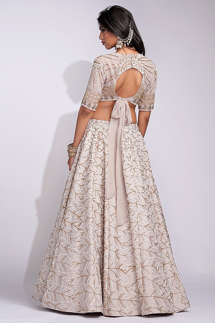 Beige Silk Upcycled Sequins Embroidered Wedding Lehenga Set by Shruti S at Pernia's Pop Up Shop