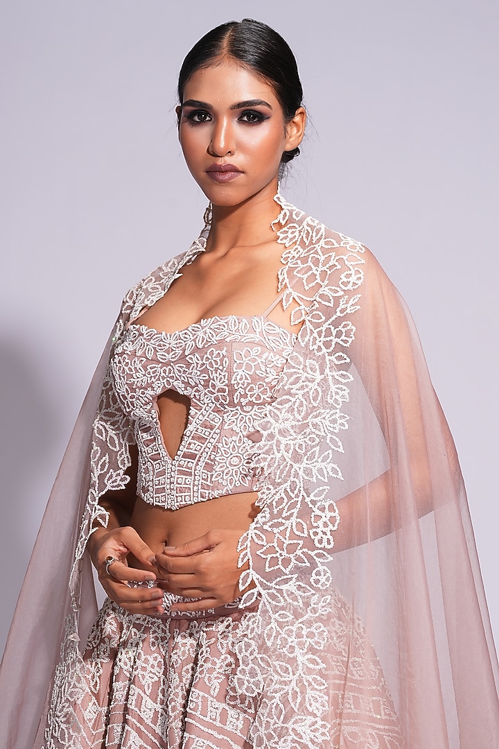 Skin Colored Silk Sequins Embroidered Wedding Lehenga Set by Shruti S at Pernia's Pop Up Shop