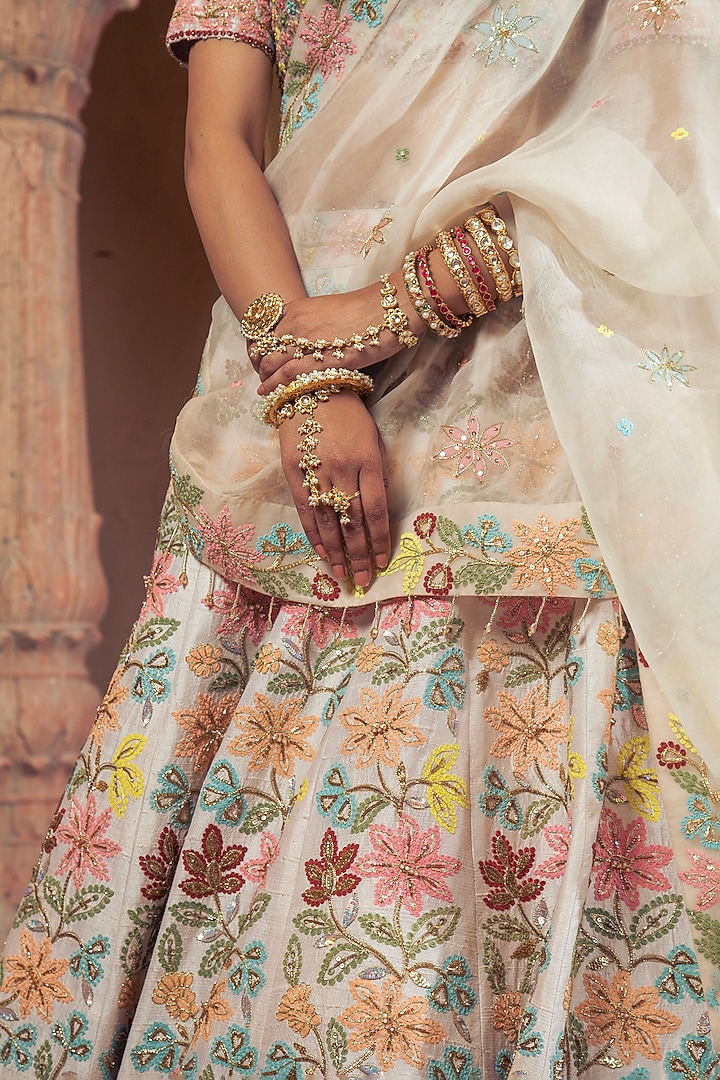 Ivory Raw Silk Embroidered Wedding Lehenga Set by Show Shaa at Pernia's Pop Up Shop