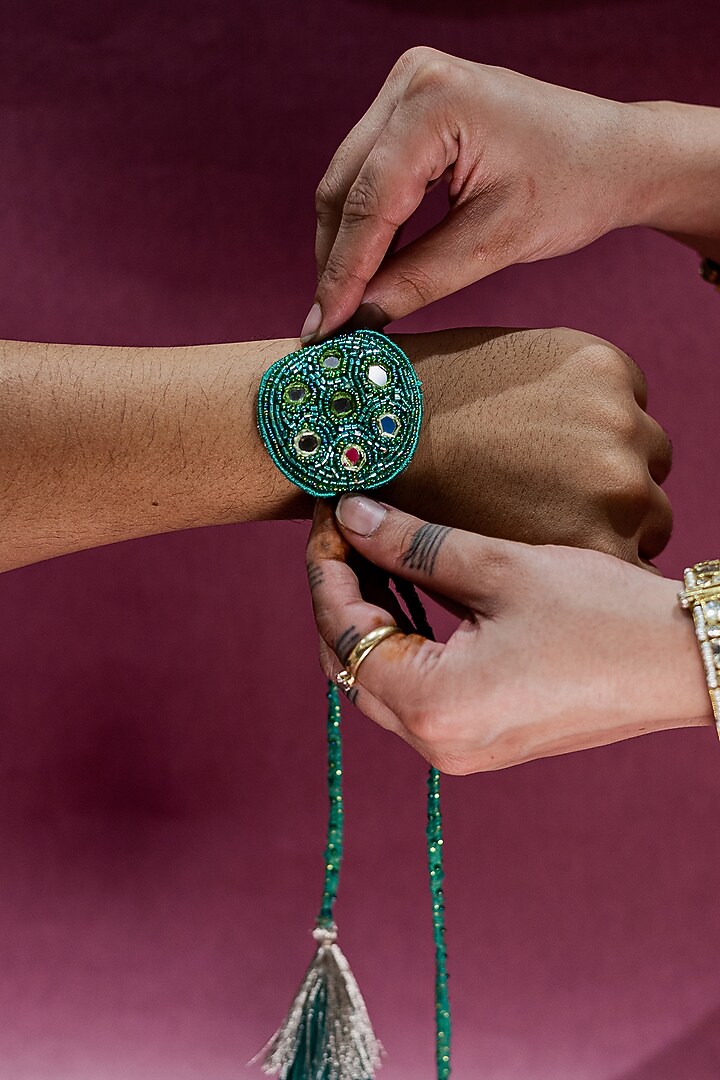 Green Embroidered Rakhi by Show Shaa at Pernia's Pop Up Shop