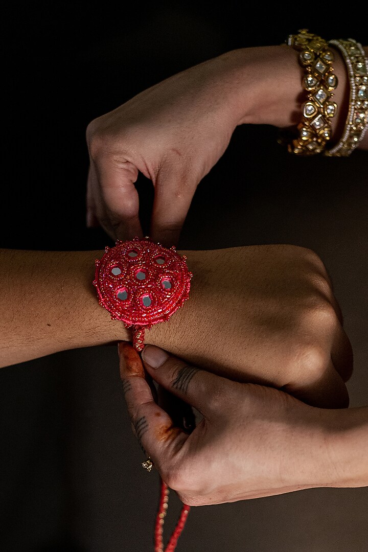 Red Embroidered Rakhi by Show Shaa at Pernia's Pop Up Shop