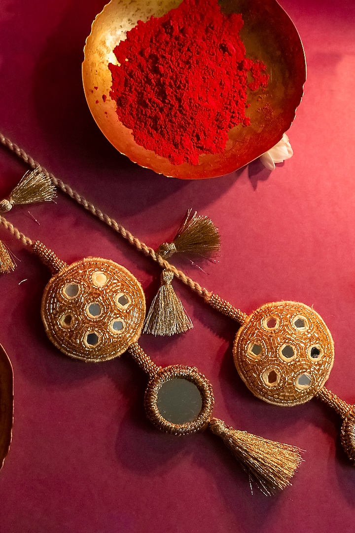 Golden Embroidered Rakhi by Show Shaa at Pernia's Pop Up Shop