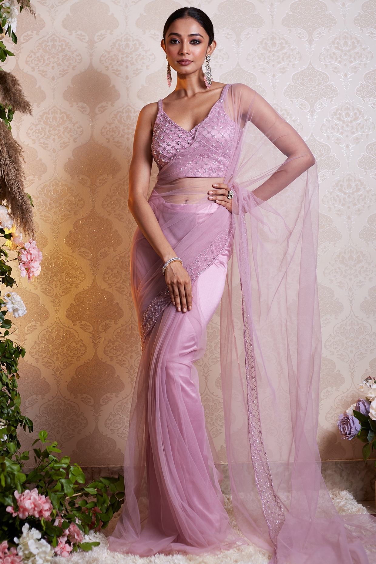 CODE WS884 : Lavender fancy dola silk saree(soft and silky) with beautiful  floral prints all over, gap borders, printed stripes as pallu, plain  running blouse with borders.