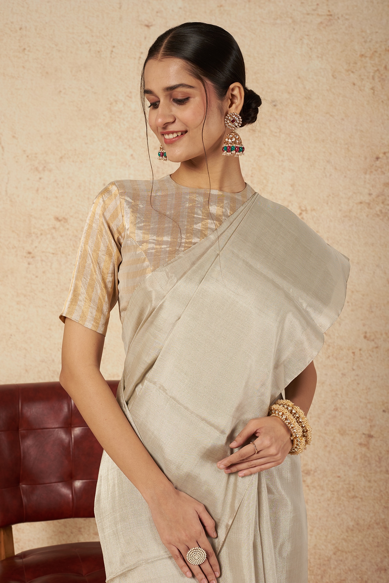 In a gold & silver color half saree, elbow length sleeve blouse design,  head piece / maang tikka a… | Best blouse designs, Unique blouse designs,  Half saree designs