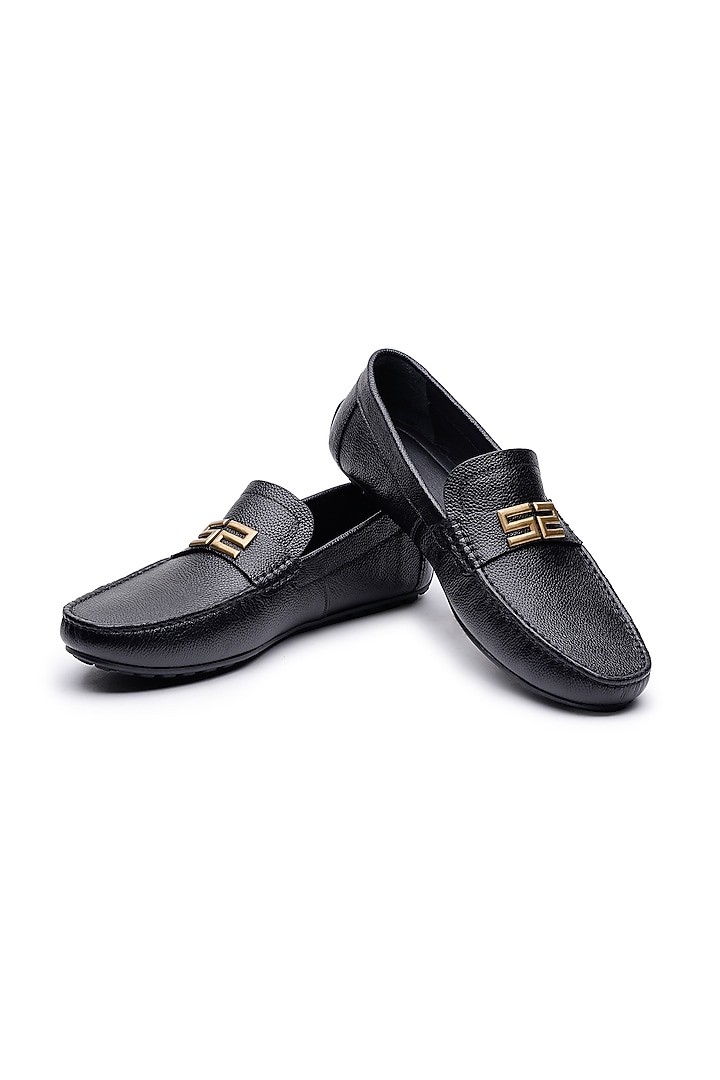 Black Leather Metal Embellished Loafers by SHUTIQ at Pernia's Pop Up Shop