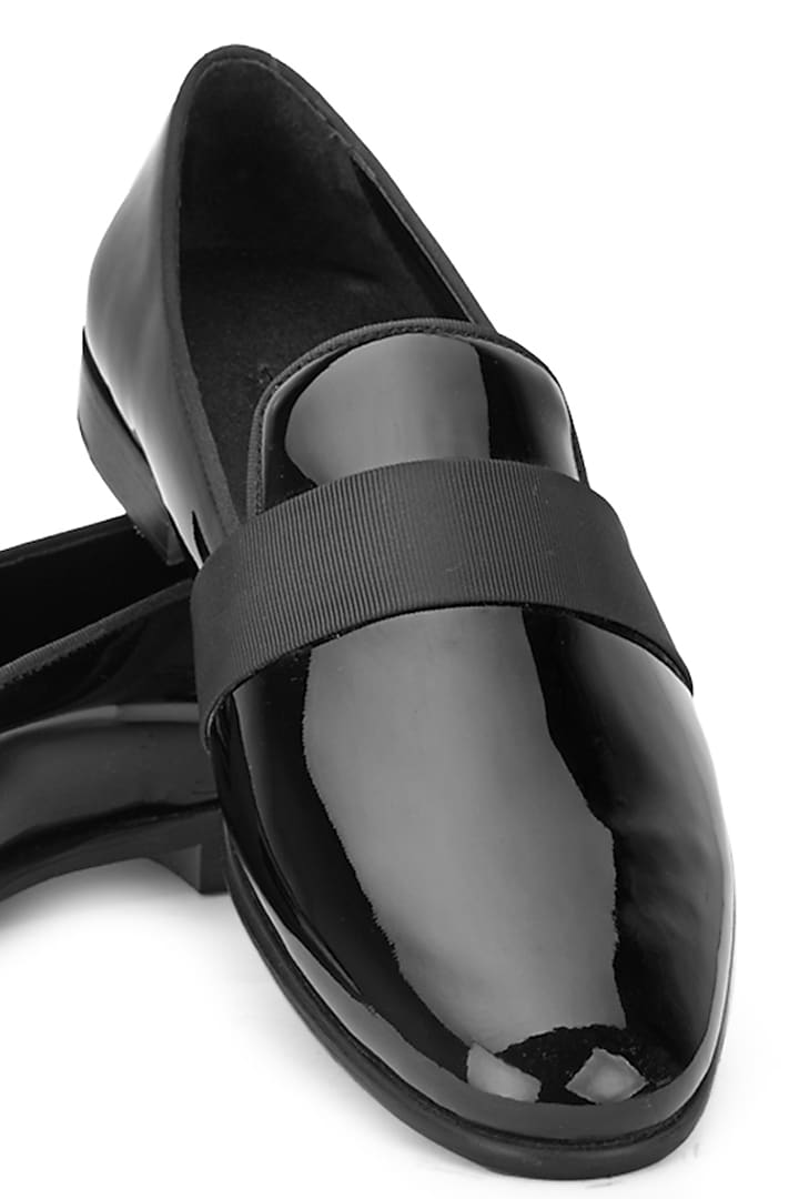 Black Leather Slip-On Shoes by SHUTIQ at Pernia's Pop Up Shop