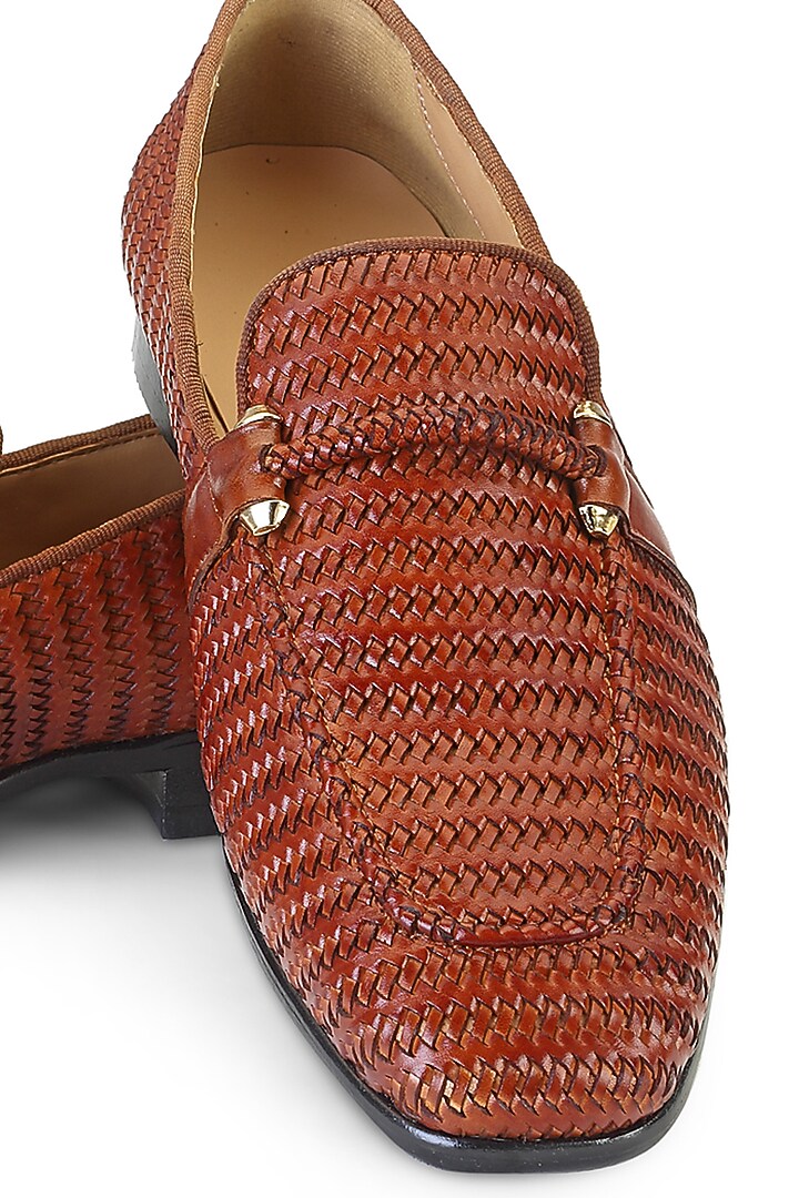 Tan Leather Embellished Slip On Shoes by SHUTIQ at Pernia's Pop Up Shop