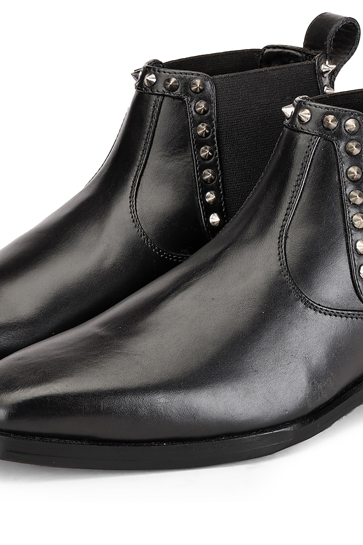 Black Leather Embellished Boots by SHUTIQ at Pernia's Pop Up Shop