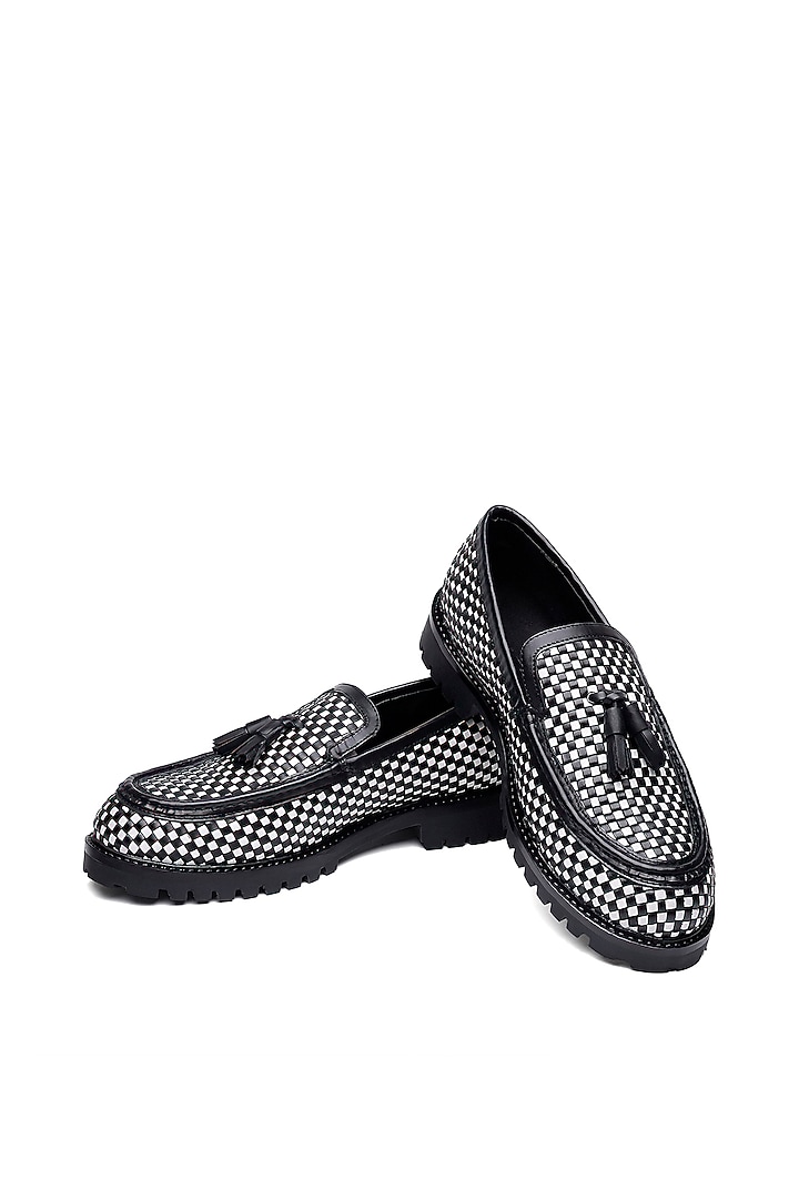 Black & White Woven Leather Slip-On Shoes by SHUTIQ at Pernia's Pop Up Shop