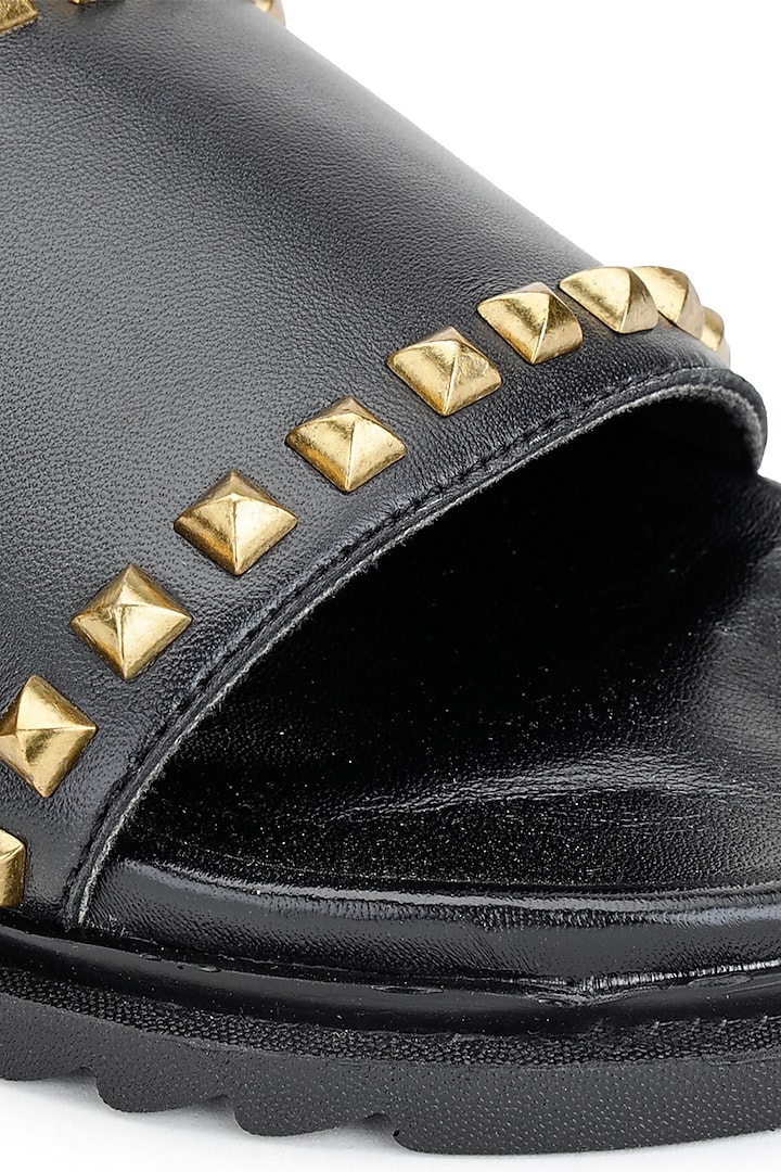 Black Leather Embellished Sliders by SHUTIQ at Pernia's Pop Up Shop