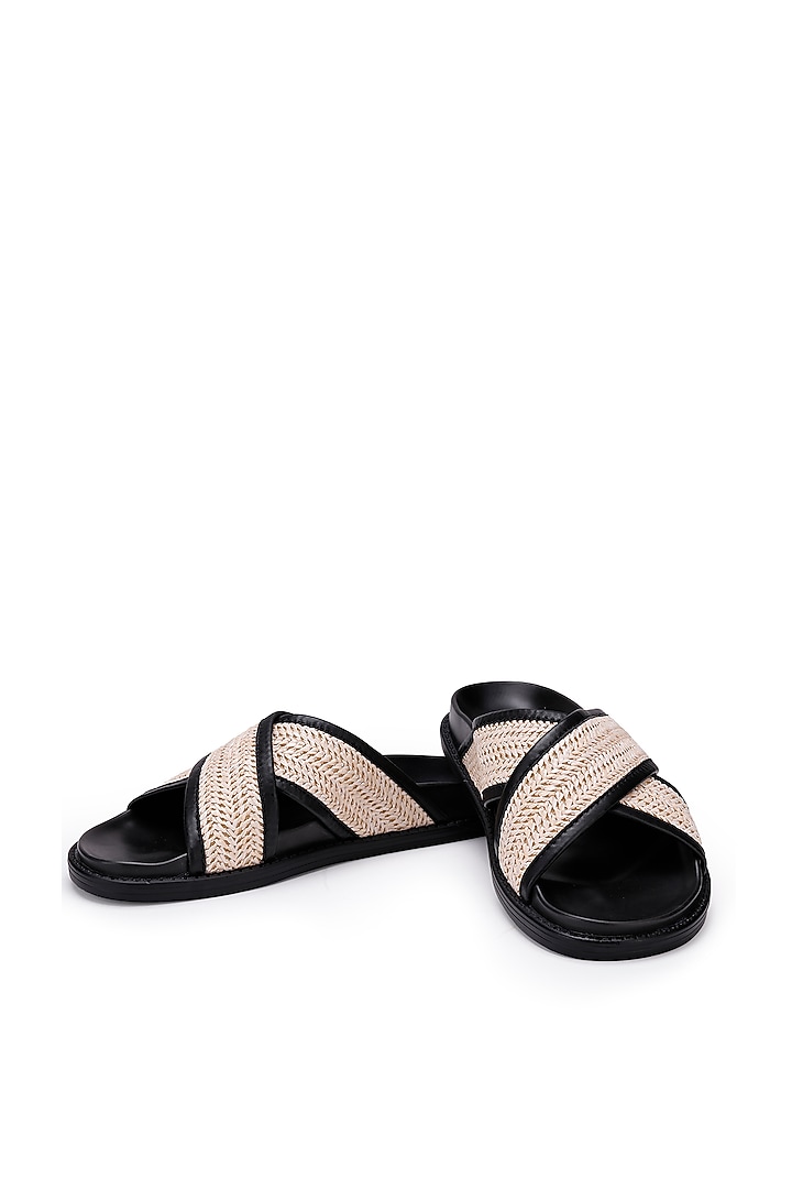 Black & White Leather Woven Slippers by SHUTIQ at Pernia's Pop Up Shop