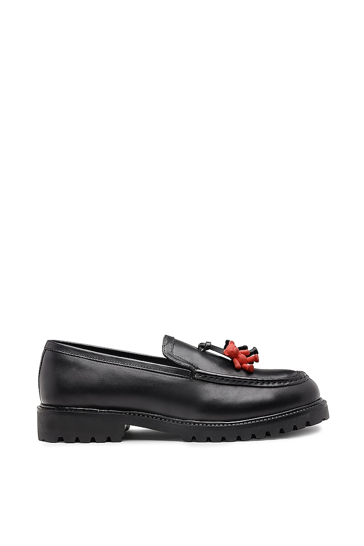 Black Leather Embellished Slip Ons by SHUTIQ at Pernia's Pop Up Shop