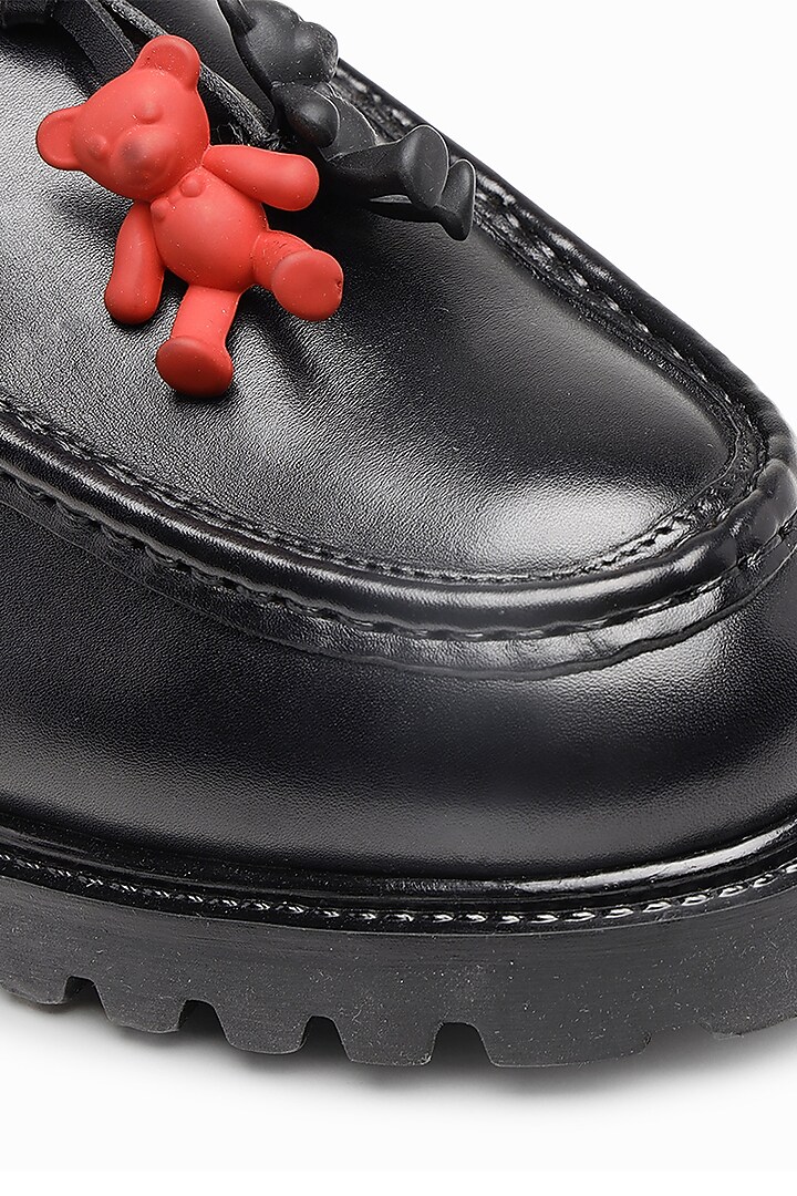 Black Leather Embellished Slip Ons by SHUTIQ at Pernia's Pop Up Shop