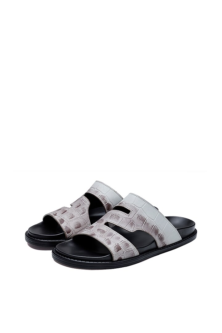 Black Leather Slip-Ons by SHUTIQ at Pernia's Pop Up Shop