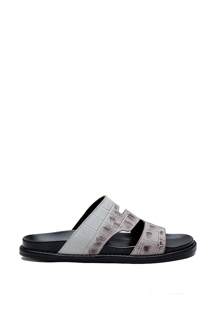 Black Leather Slip-Ons by SHUTIQ at Pernia's Pop Up Shop