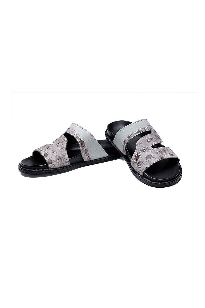 Black Leather Slip-Ons by SHUTIQ at Pernia's Pop Up Shop