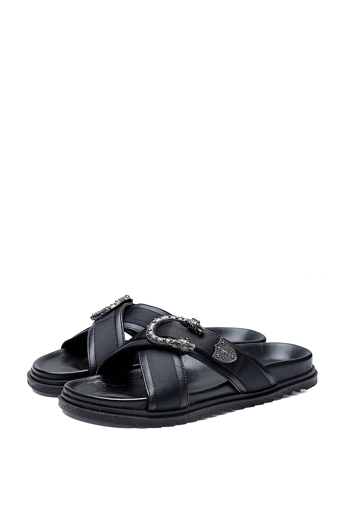 Black Leather Criss-Cross Strap Slip-Ons by SHUTIQ at Pernia's Pop Up Shop