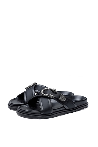Black Leather Criss-Cross Strap Slip-Ons by SHUTIQ