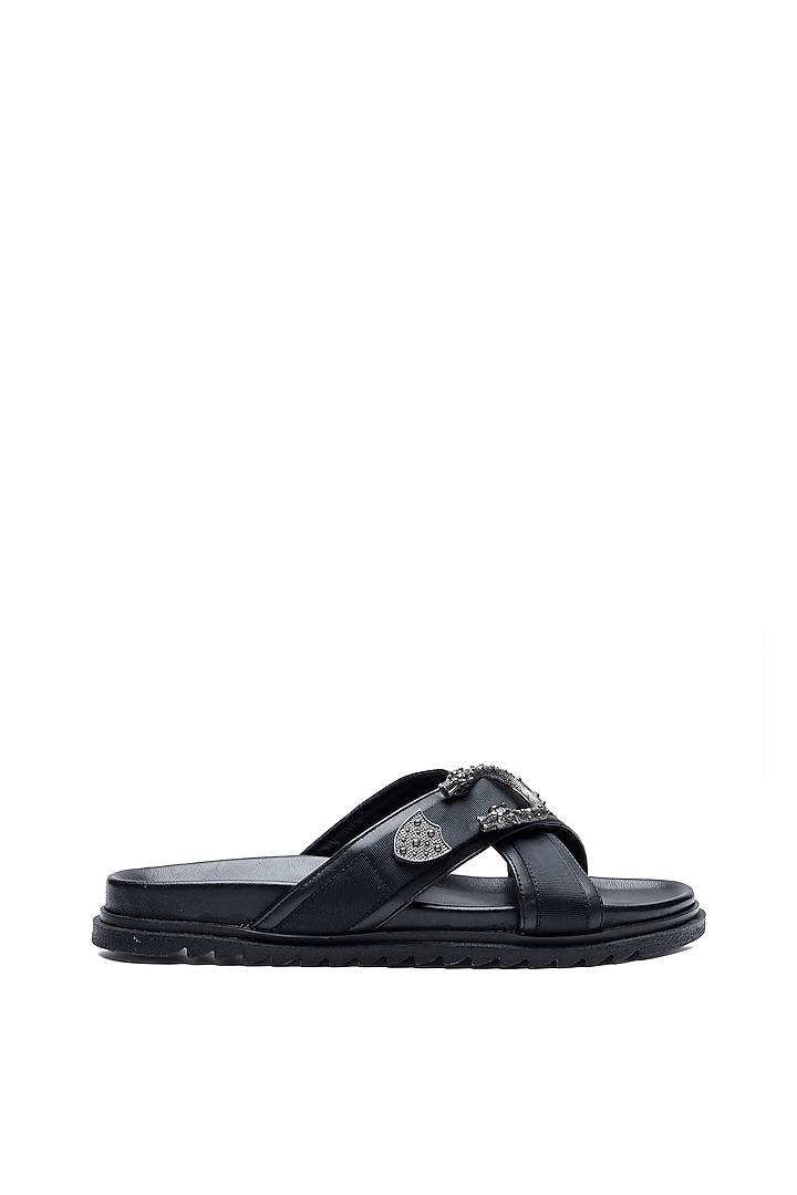 Black Leather Criss-Cross Strap Slip-Ons by SHUTIQ at Pernia's Pop Up Shop