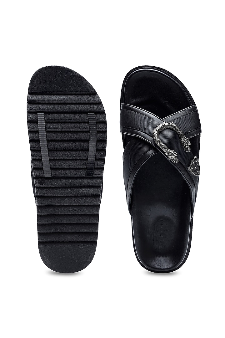 Black Leather Criss-Cross Strap Slip-Ons by SHUTIQ at Pernia's Pop Up Shop
