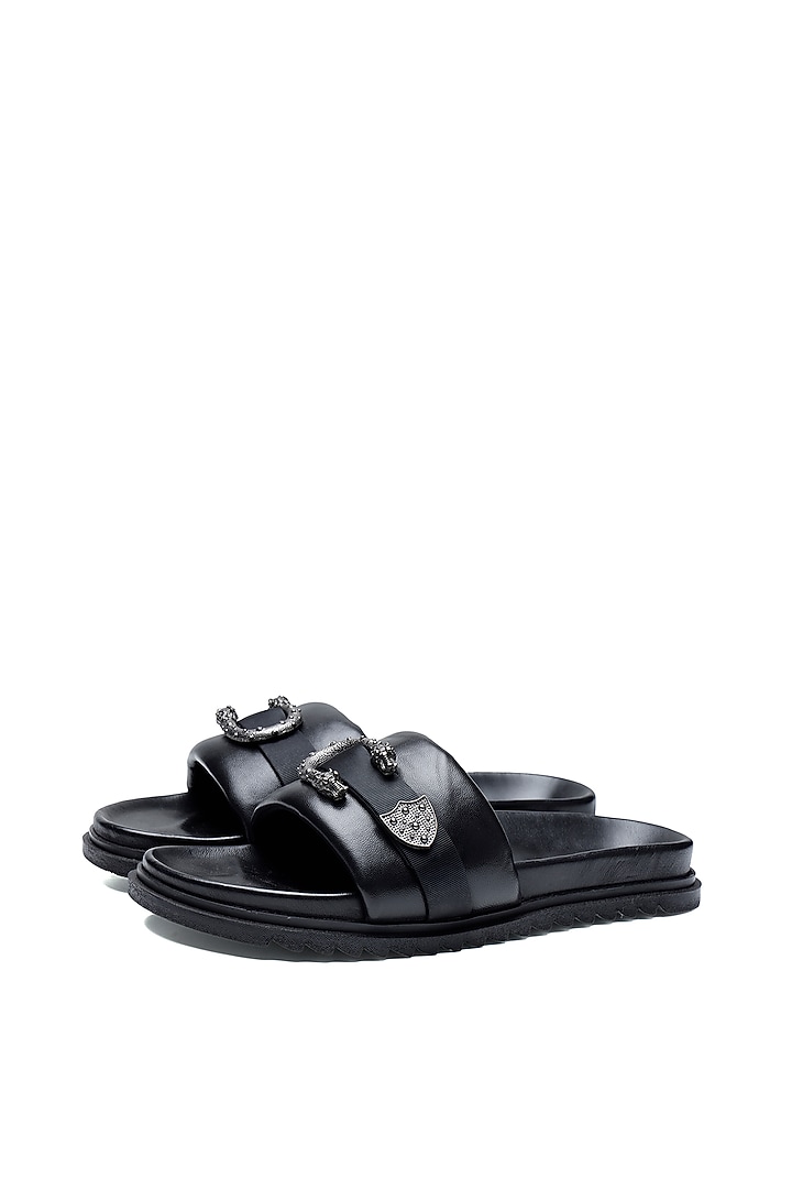 Black Leather Criss-Cross Strap Slip-Ons by SHUTIQ at Pernia's Pop Up Shop