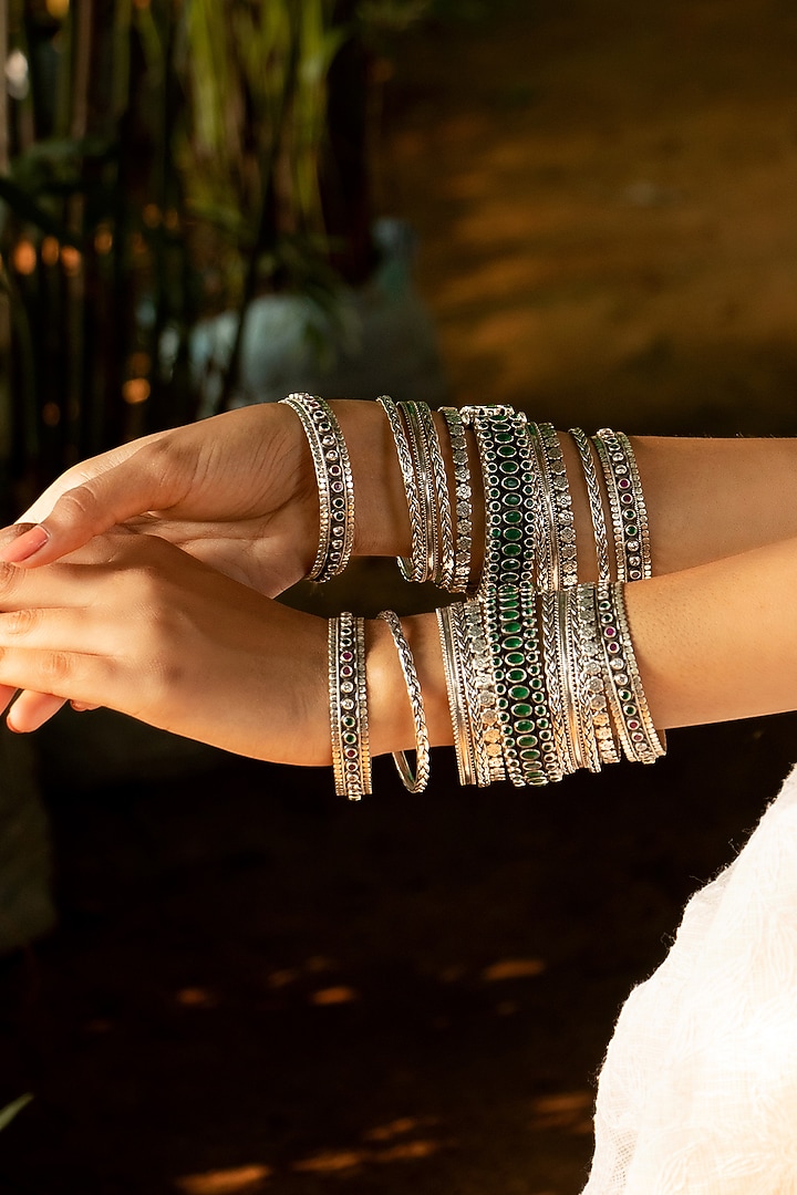 Silver Finish Handcrafted Bangles In Sterling Silver (Set of 11) by Shyle at Pernia's Pop Up Shop