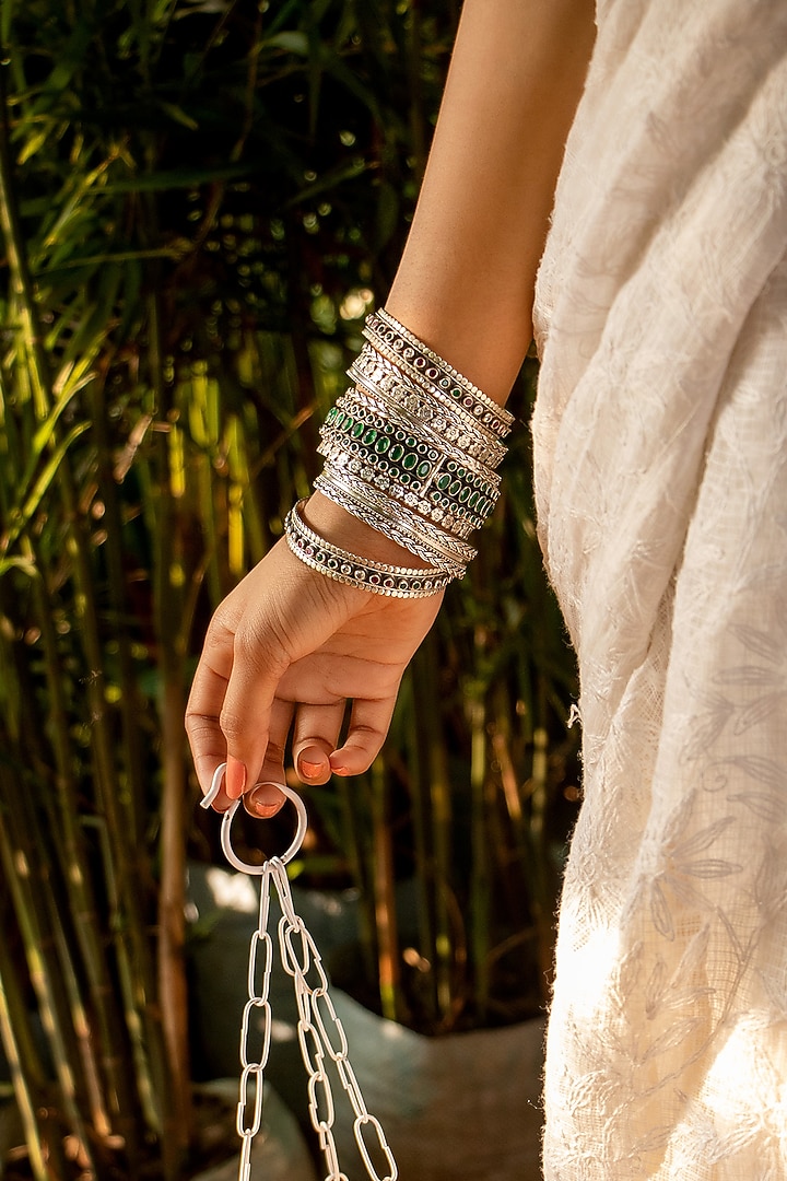 Silver Finish Handcrafted Bangles In Sterling Silver (Set of 11) by Shyle at Pernia's Pop Up Shop