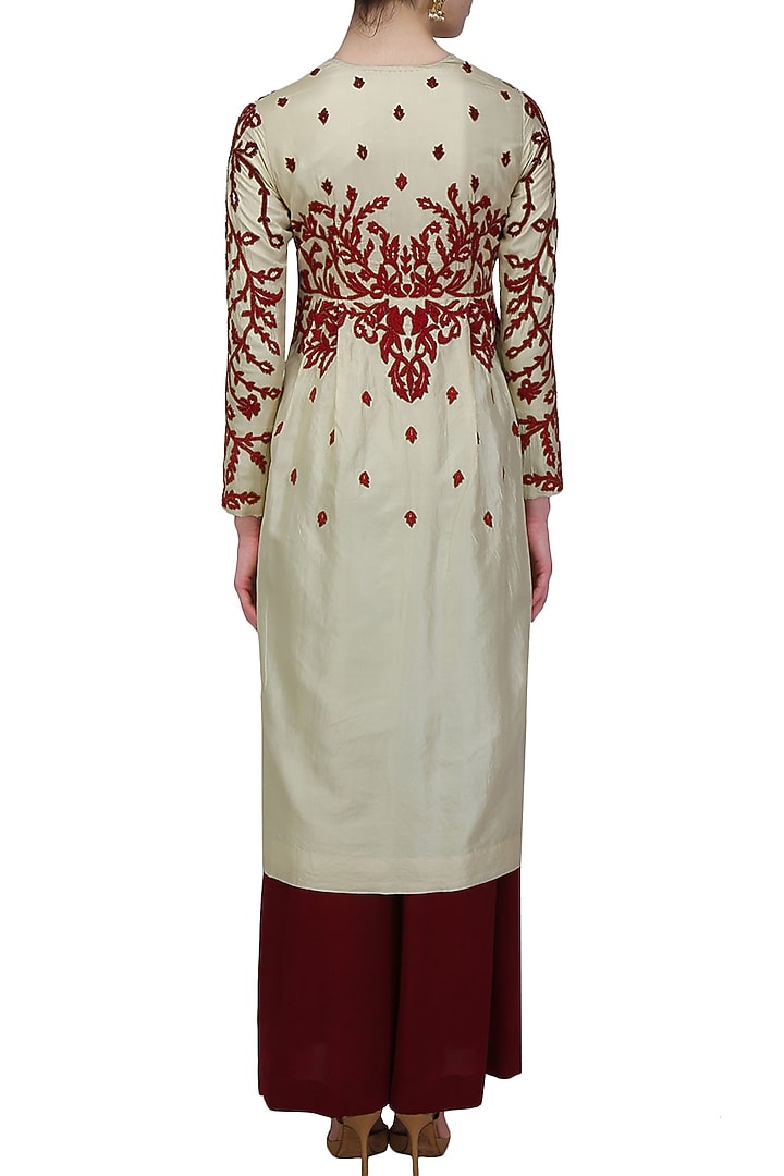 Cream and red floral thread embroidered kurta and maroon palazzo pants set available only at Pernia's Pop Up Shop.