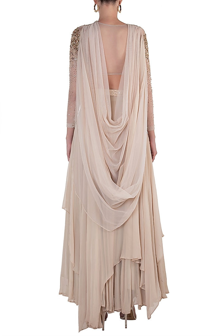 Beige embellished blouse with lehenga skirt and belt available only at Pernia's Pop Up Shop.