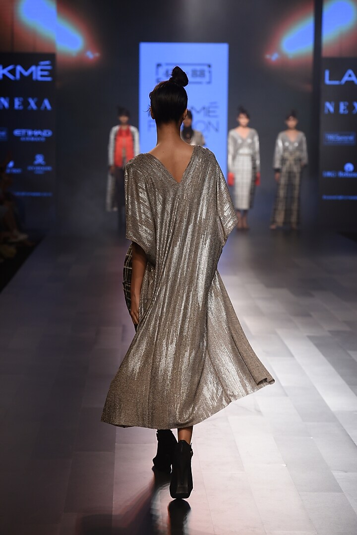 Dusty gold metallic coverup available only at Pernia's Pop Up Shop.