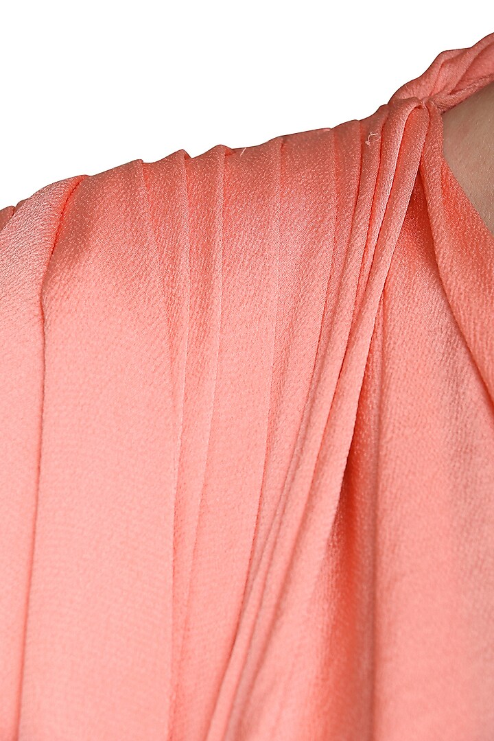 Pink asymmetrical dress available only at Pernia's Pop Up Shop.