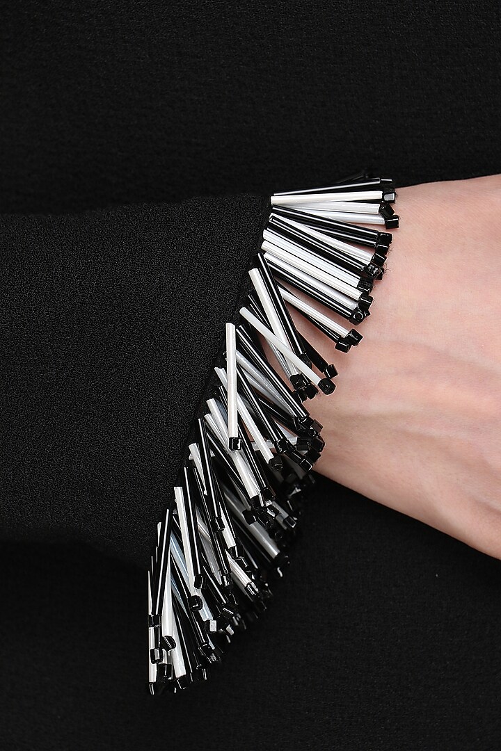 Black tassels embellished top available only at Pernia's Pop Up Shop.