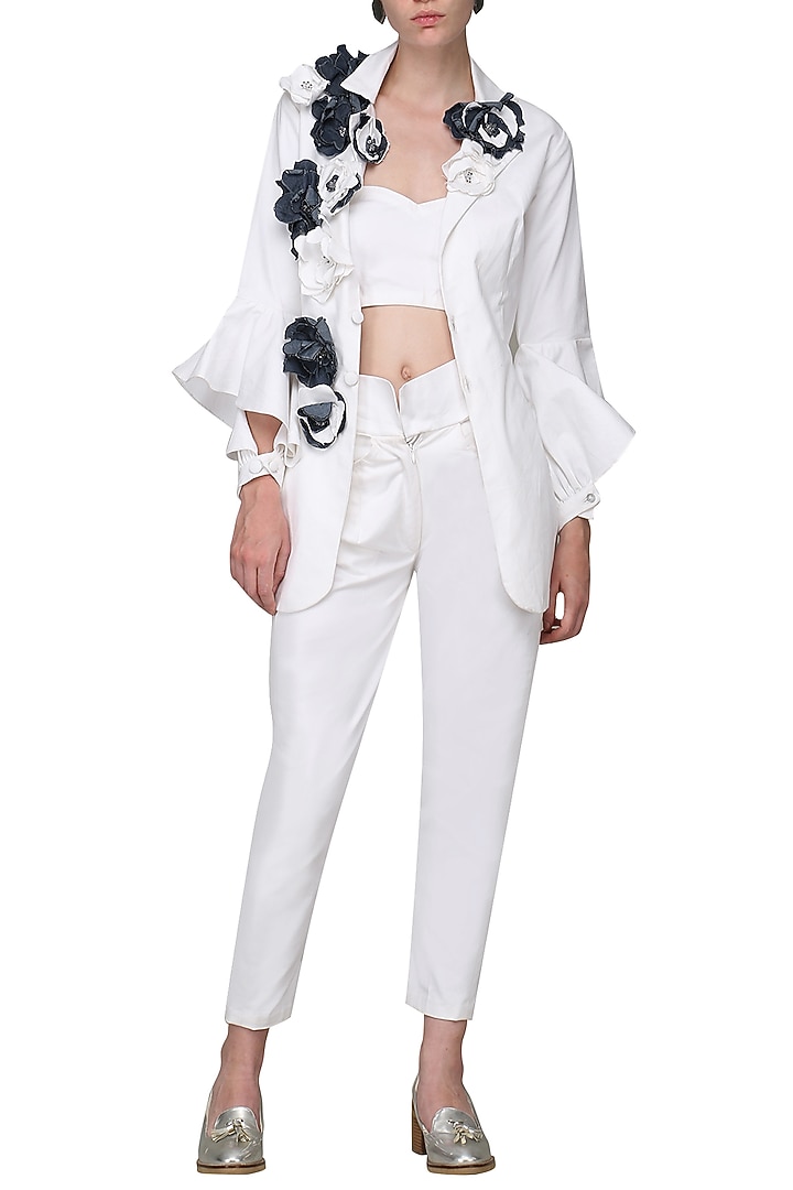 White embellished denim jacket available only at Pernia's Pop Up Shop.