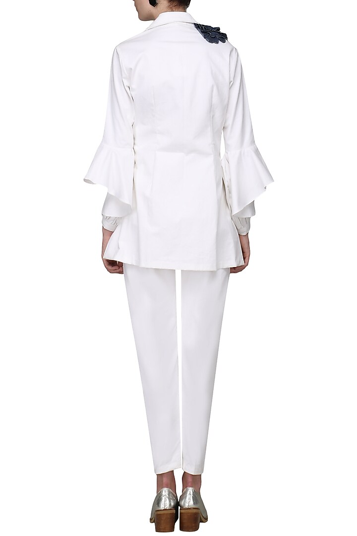 White embellished denim jacket available only at Pernia's Pop Up Shop.
