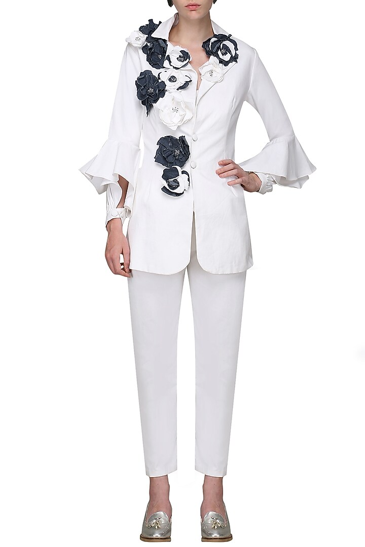 White embellished denim jacket available only at Pernia's Pop Up Shop.