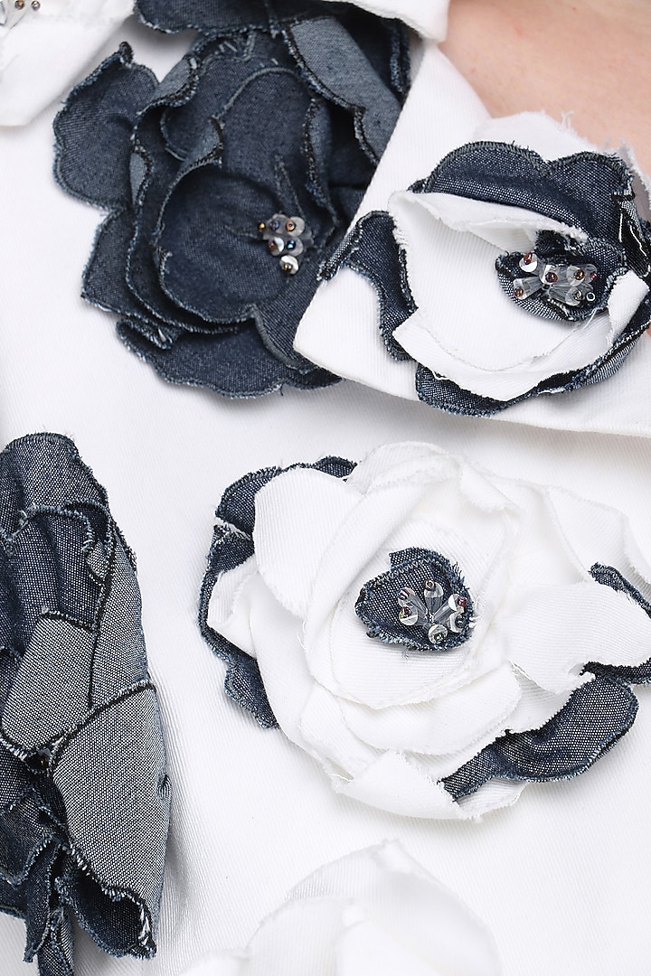 White embellished denim jacket available only at Pernia's Pop Up Shop.
