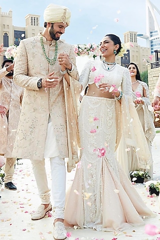 Powder Peach Embroidered Fish-Cut Lehenga Set by Seema Gujral