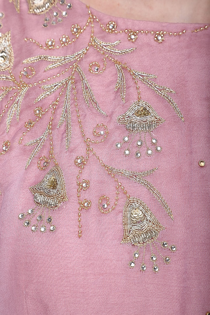 Lavender asymmetrical embroidered cape with pink top and flare pants available only at Pernia's Pop Up Shop.