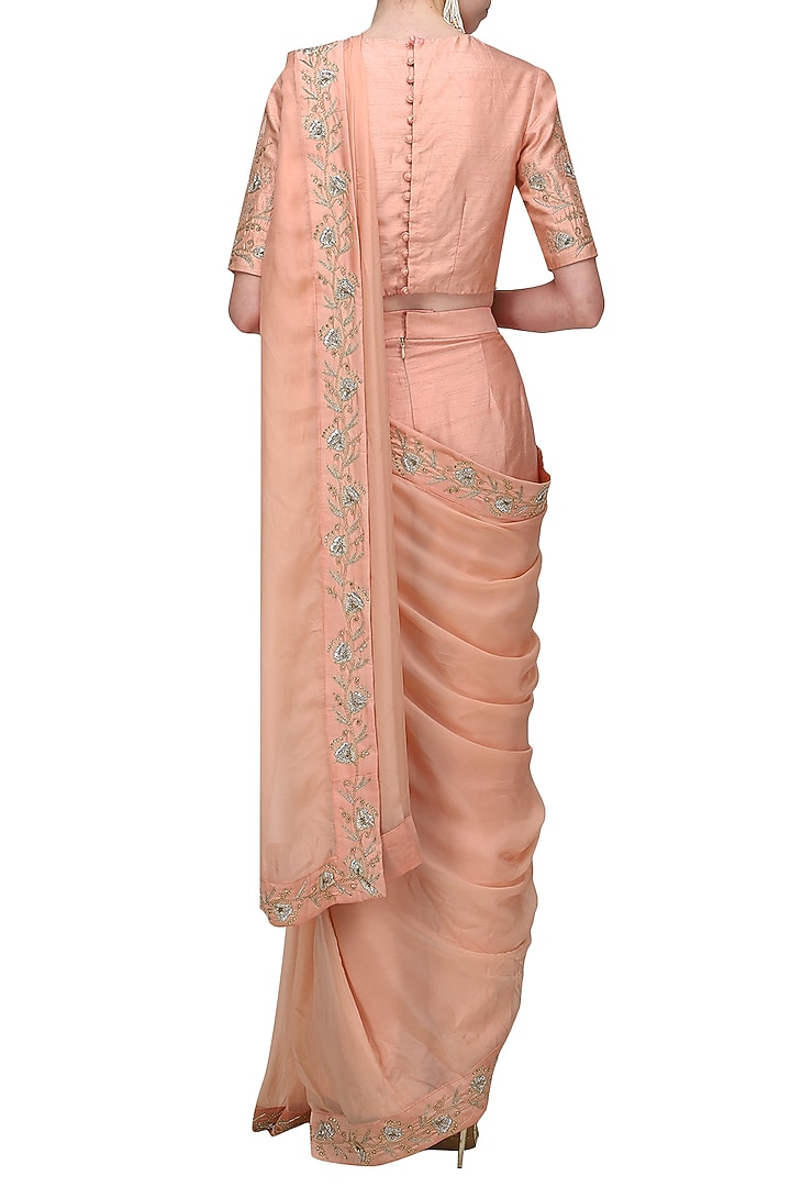 Peach embroidered draped saree set available only at Pernia's Pop Up Shop.
