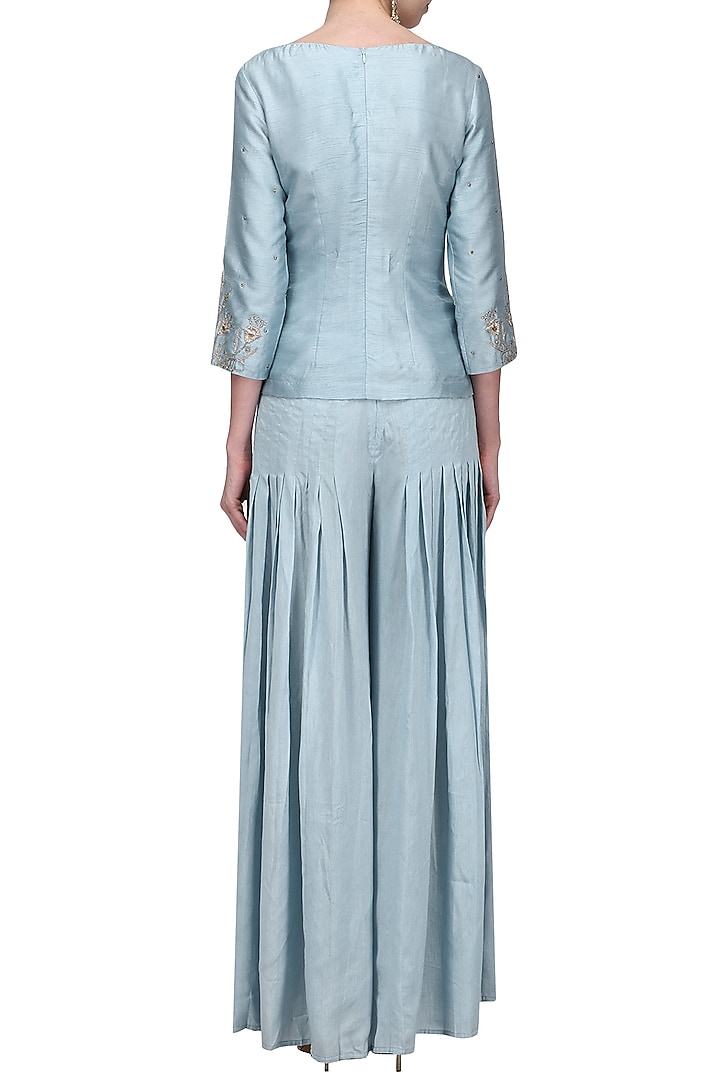 Powder blue embroidered top with pleated pants and dupatta available only at Pernia's Pop Up Shop.
