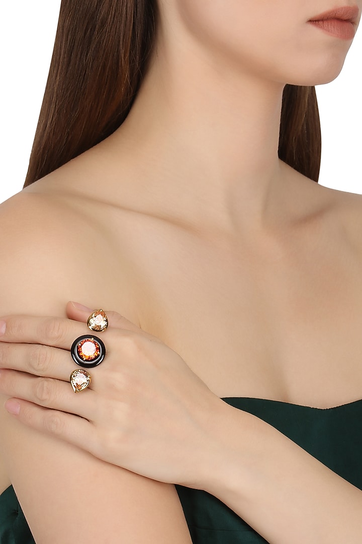Gold plated black onyx, red and peach cubic zirconia stones multi-finger ring available only at Pernia's Pop Up Shop.