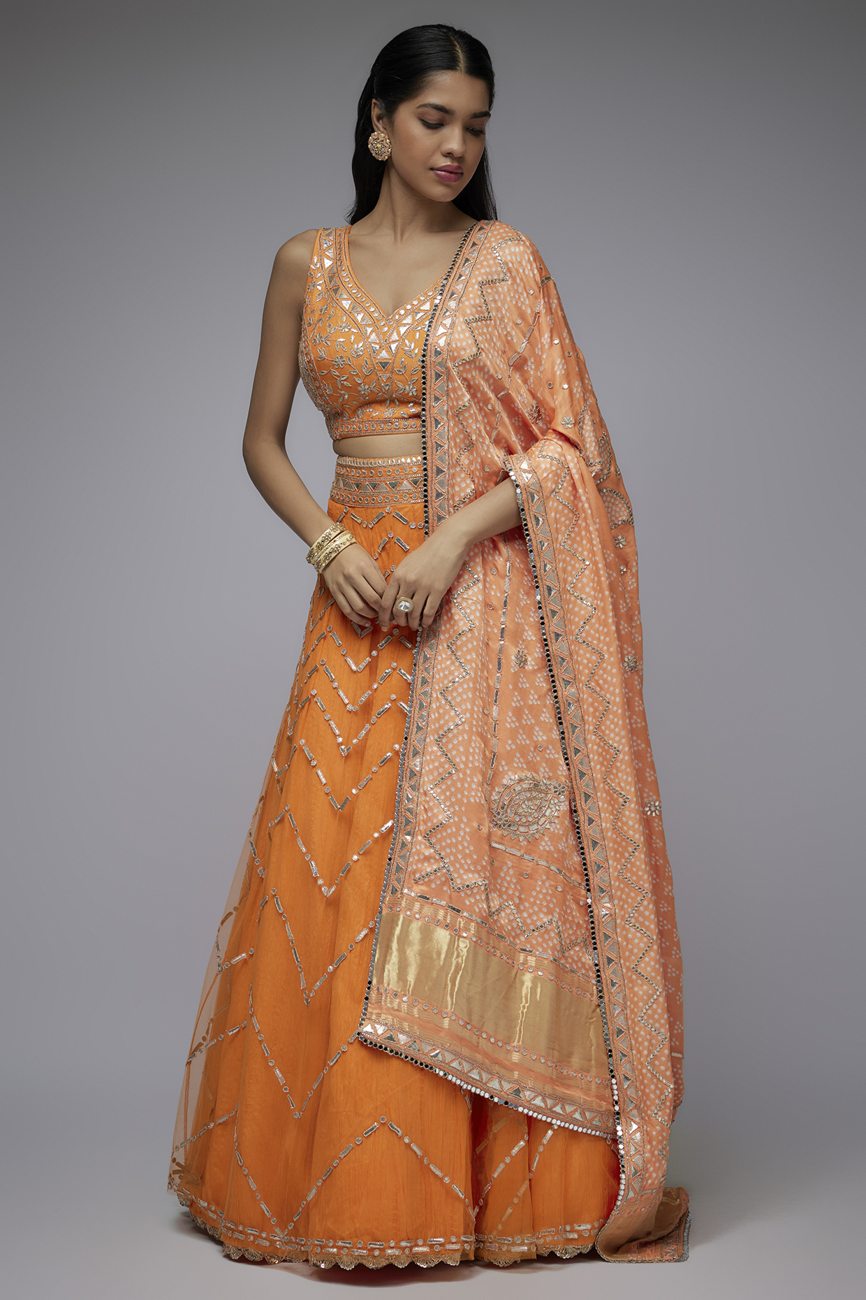 Orange Net & Silk Crushed Overlay Wedding Lehenga Set by Siddhartha Daga at Pernia's Pop Up Shop