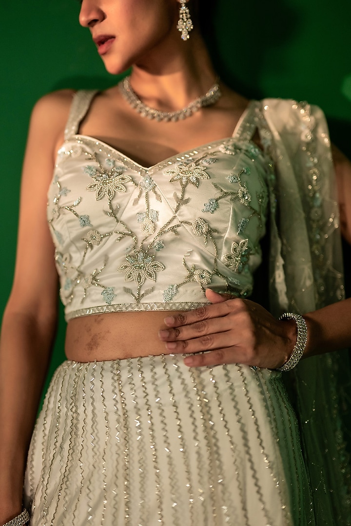 Ice Blue Tulle Applique Work Bridal Lehenga Set by Siddhartha Daga at Pernia's Pop Up Shop