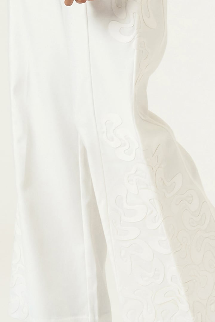 Ivory Patchwork Embroidered Wide-Leg Trousers by SIDDHANT AGRAWAL at Pernia's Pop Up Shop