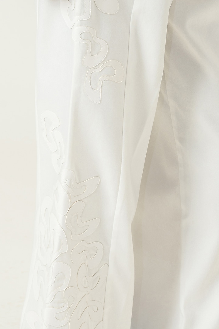 Ivory Patchwork Embroidered Wide-Leg Trousers by SIDDHANT AGRAWAL at Pernia's Pop Up Shop